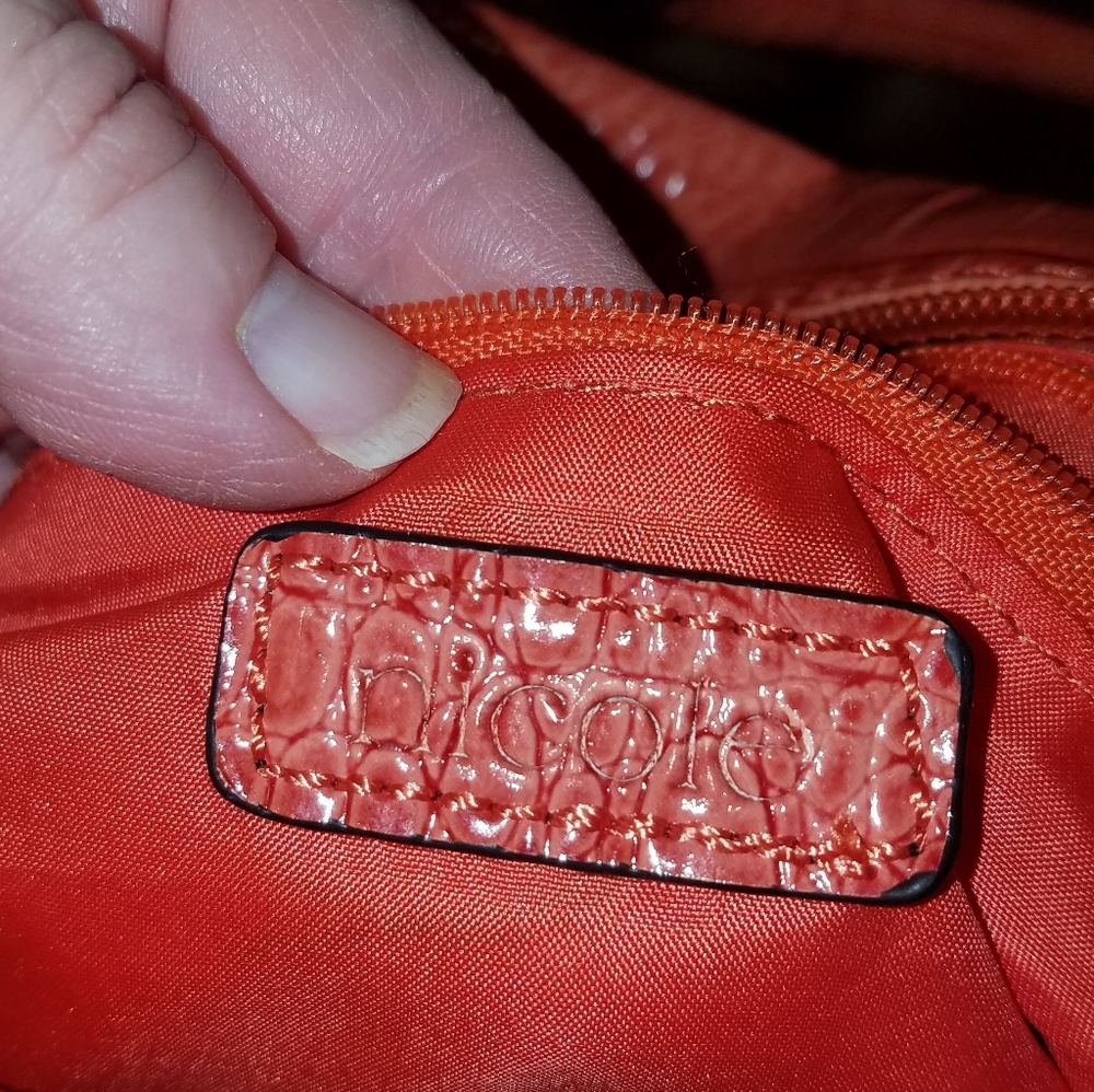 Beautiful Nicole Miller purse.

Please go to my pa - Picture 3 of 5